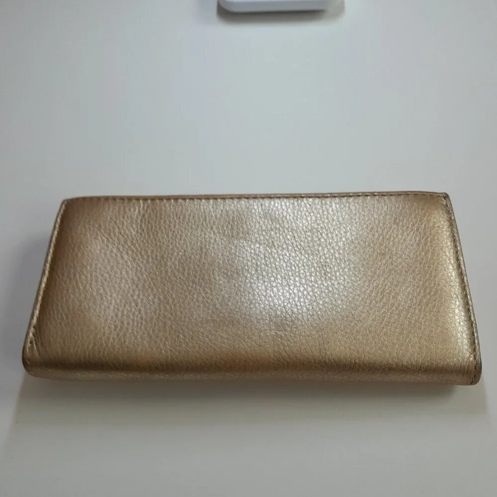 MICHAEL KORS JET SET TRAVEL LARGE ACCORDION WALLET GOLD